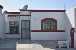 CASA CERCA DE CENTRO COMERCIAL